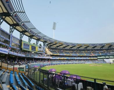 A baseball stadium filled with lots of people